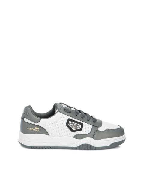 perforated low-top street trainers