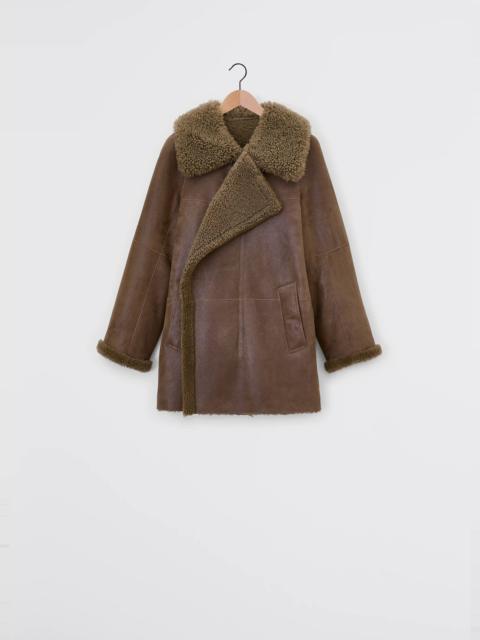 ASYMMETRICAL SHEARLING COAT