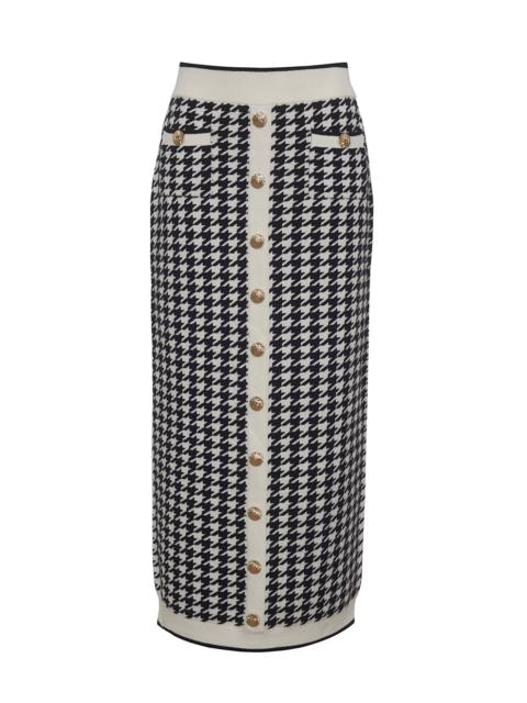 Ronnie Skirt
Houndstooth Chic Meets Modern Flair