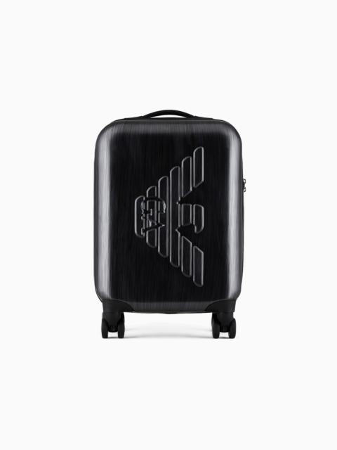 ABS carry-on bag with oversized, embossed eagle