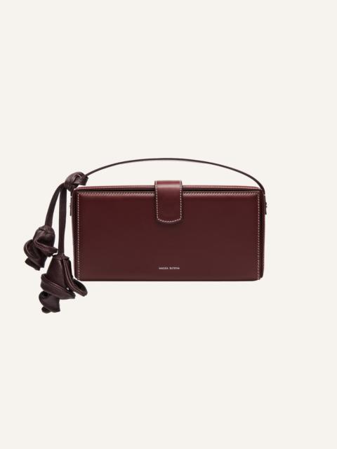 Apolonia bag in burgundy leather with flower charm