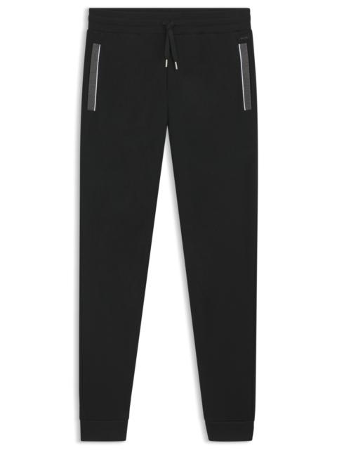 TRACKSUIT BOTTOMS WITH POCKET DETAIL