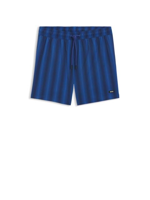 LOGO-BADGE SWIM SHORTS WITH STRIPE