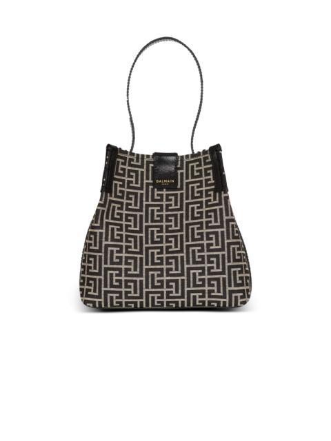 Release Bucket bag in jacquard and calfskin