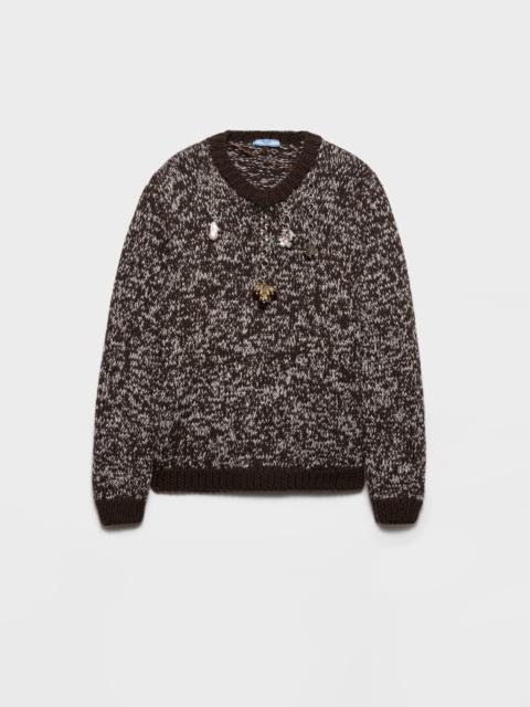 Wool crew-neck sweater with pendants