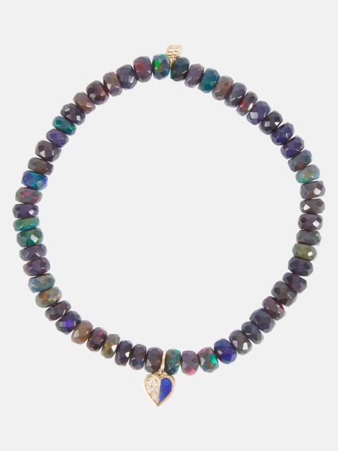 Heart 14kt gold charm bracelet with diamonds and opals