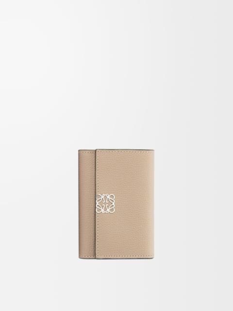Anagram small vertical wallet in pebble grained calfskin