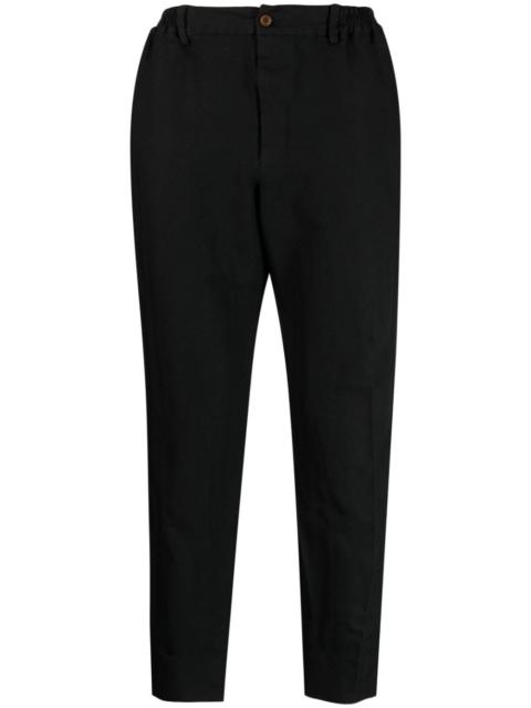 chevron-pattern tapered trousers