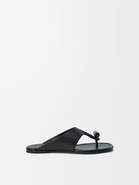 Toggle flat sandal in shiny smoot calfskin