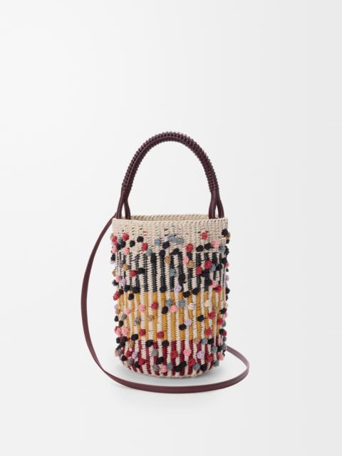 Bucket in cord, leather and wool