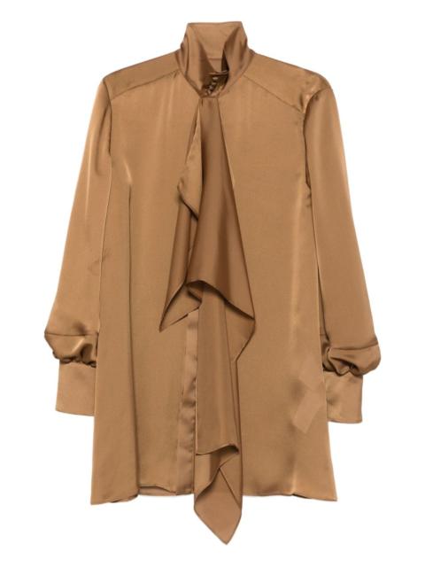 high-neck ruffled shirt