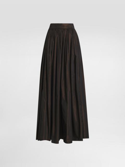Long circle skirt in iridescent taffeta