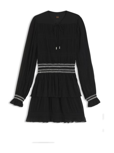 PLISSÉ DRESS WITH SMOCK-STITCHED WAISTBAND