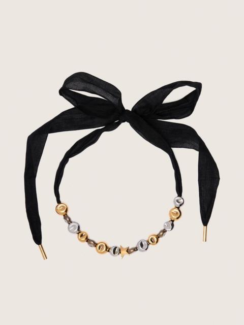 Black ribbon choker with studs