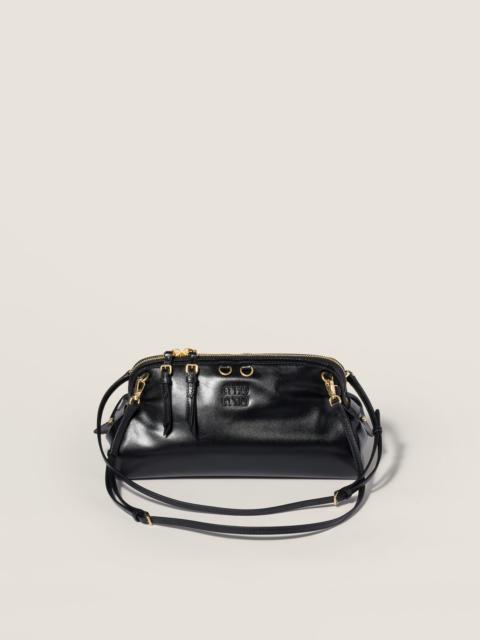 Caprice shiny leather clutch