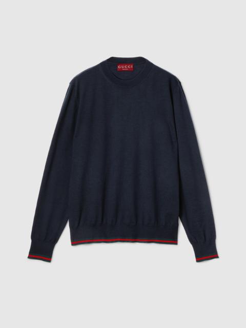 Wool knit sweater with Web