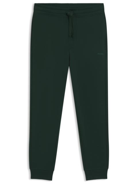 CUFFED SWEATPANTS IN COTTON TERRY WITH LOGO PRINT