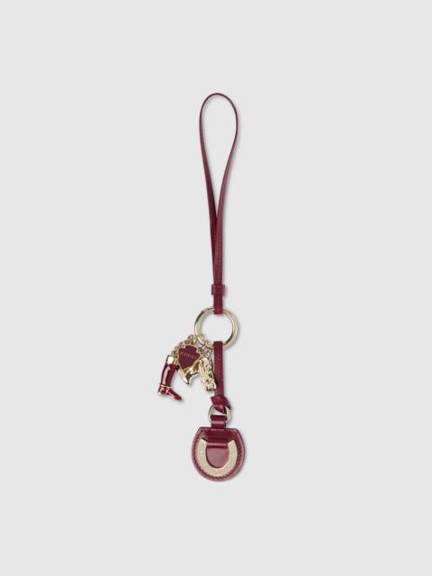 Horseshoe-shaped bag charm