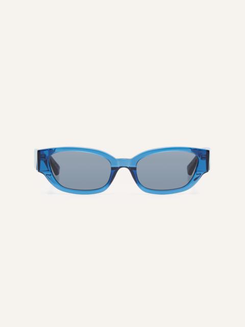 'I need a holiday' sunglasses in blue