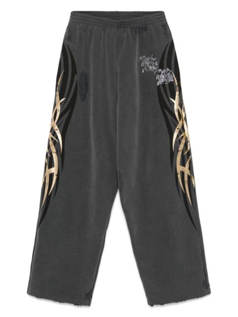 tacky gold-print track pants