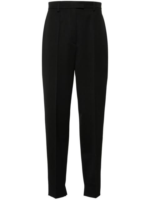 pressed-crease tapered-leg trousers