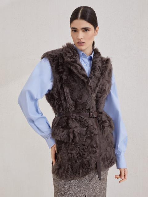 Wavy shearling vest with leather belt and monili