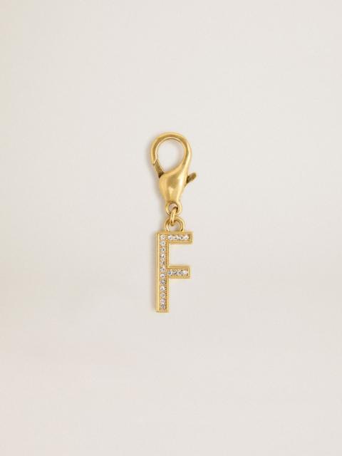 Letter F charm in gold-colored brass with crystals