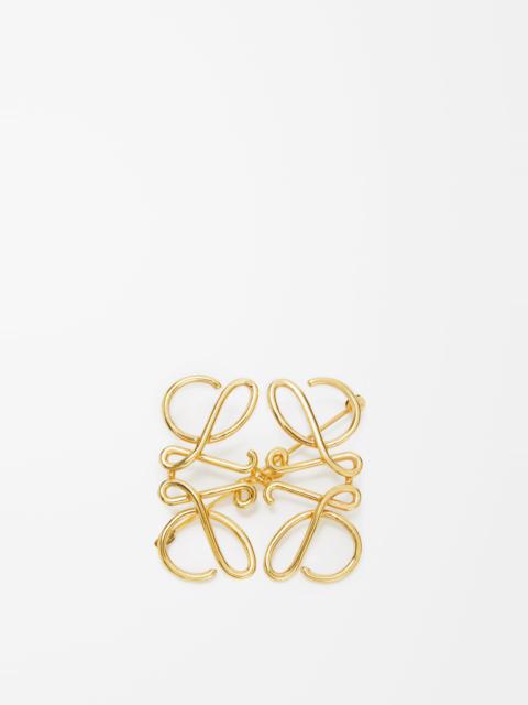 Anagram brooch in metal