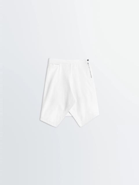 ASYMMETRIC SKIRT IN DENIM