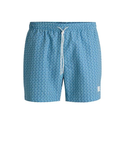 DRAWSTRING-WAIST SWIM SHORTS WITH ALL-OVER PRINT