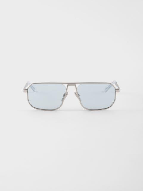 Sunglasses with the iconic metal plaque
