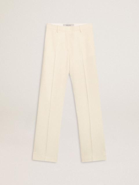 Women's loose pants in worn-white tailored fabric