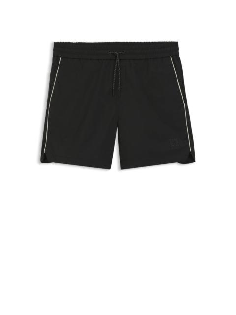 CONTRAST-PIPING SHORTS WITH WATER-REPELLENT FINISH