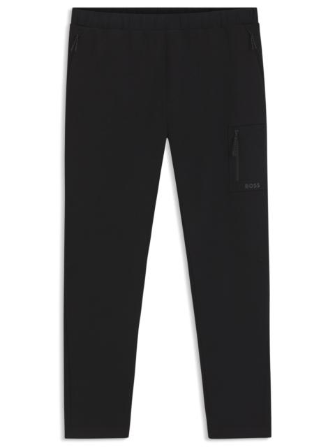 REGULAR-FIT TRACKSUIT BOTTOMS WITH DECORATIVE REFLECTIVE DETAILS