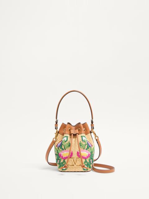 VLOGO SIGNATURE MINI BUCKET BAG IN SYNTHETIC RAFFIA WITH FLORAL EMBROIDERY