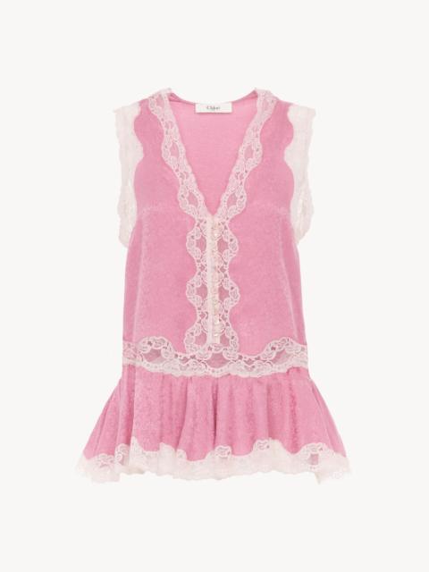 SLEEVELESS PEPLUM TOP IN SILK JACQUARD & LACE