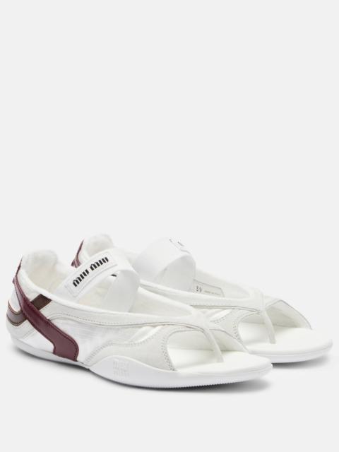 Gymnasium leather-trimmed thong sandals