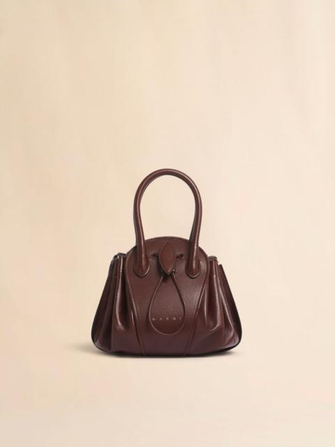 BROWN LEATHER TULIPEA SMALL HANDBAG