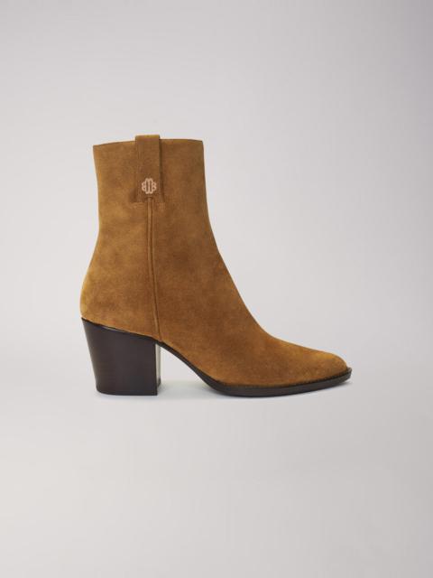 Cowboy boots in camel suede leather