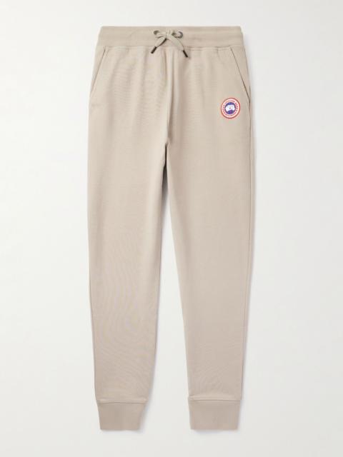 Huron Tapered Logo-Appliquéd Cotton-Jersey Sweatpants Beige