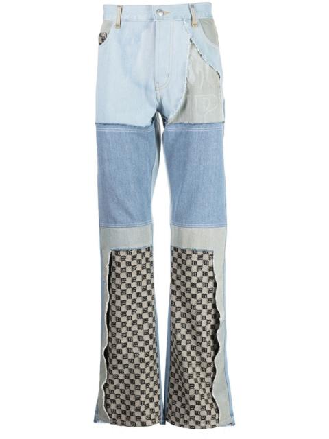 upcycled monogram-patchwork jeans