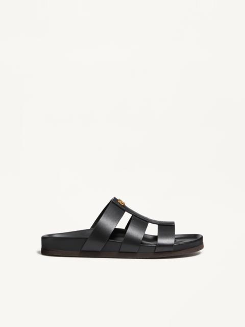 STUDSHIELD SLIDE SANDAL IN CALFSKIN