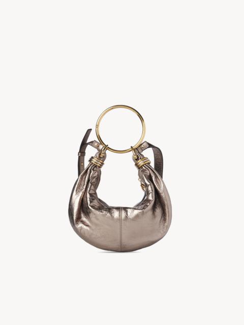 SMALL BRACELET HOBO BAG IN METALLIZED LEATHER