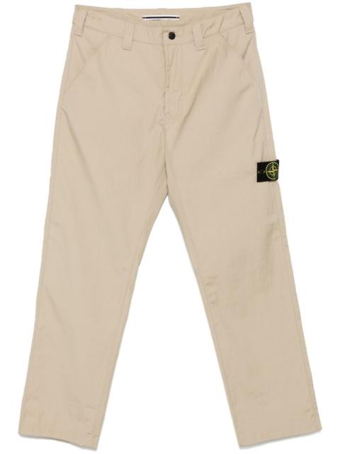 Compass-badge trousers
