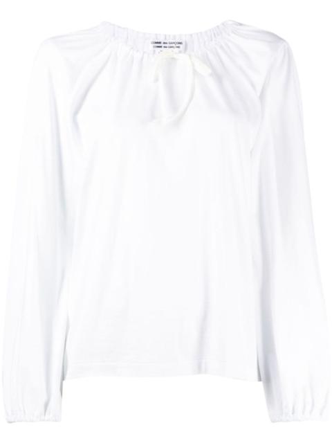 long-sleeved cotton blouse