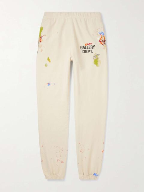 Tapered Logo-Print Paint-Splattered Cotton-Jersey Sweatpants