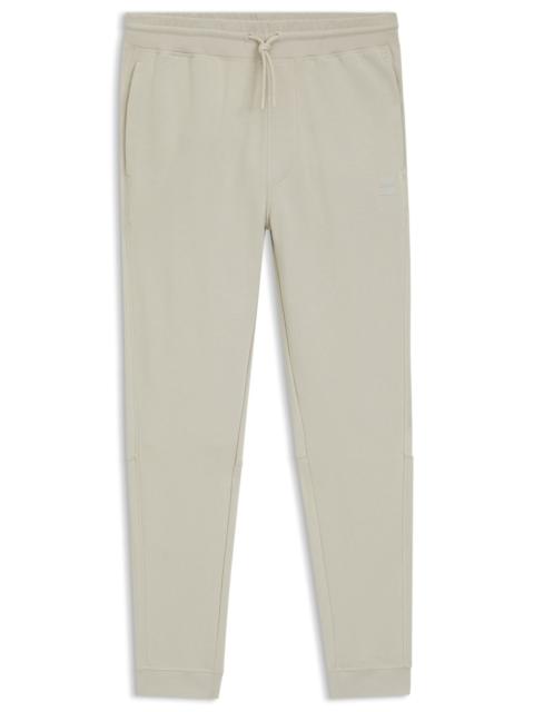 COTTON-TERRY TRACKSUIT BOTTOMS WITH LOGO PATCH