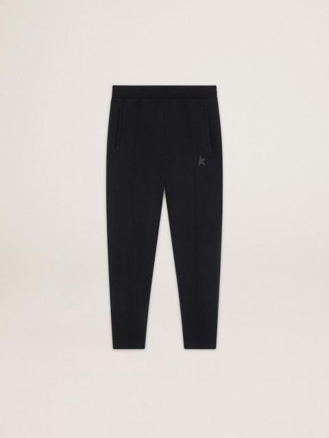 Men's black joggers with star on the front
