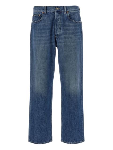 button-fastening five-pocket jeans