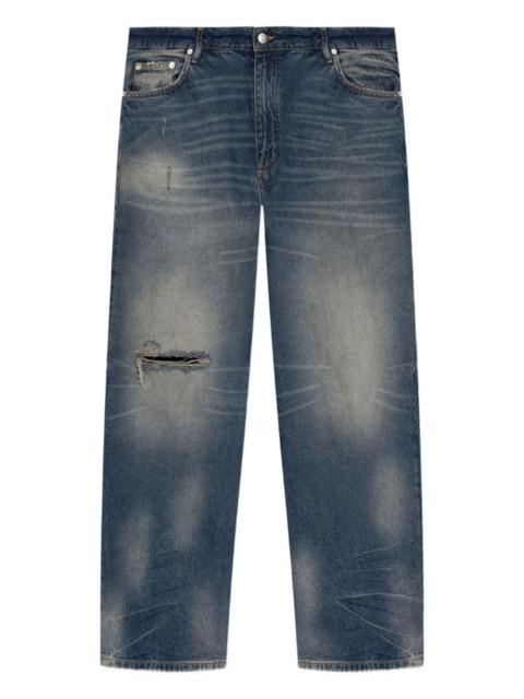 distressed-knee jeans